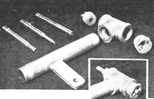 THREE INTERCHANGEABLE JETS (for different fuels) slip through bored plug and deflector made from bushing, as in insert. Braze blades at 15-degree angle from axis.